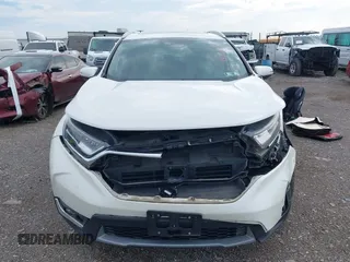 2018 Honda CR-V Touring with VIN 2HKRW2H91JH665241, listed as a IAAI auction lot 42638694 with 62,066 mi miles and . Bid and sale history available at DreamBid. Image 12.