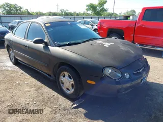 1998 Ford Taurus LX z VIN 1FAFP52U2WA259200, wystawiony jako IAAI lot #42195969 z przebiegiem 207 966 mil mil oraz . Historia ofert i sprzedaży dostępna na DreamBid. Obrazek 1.