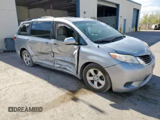 2014 Toyota Sienna LE AAS with VIN 5TDKK3DCXES518968, listed as a Copart auction lot 59553905 with 176,074 mi miles and Salvage title. Bid and sale history available at DreamBid. Image 4.