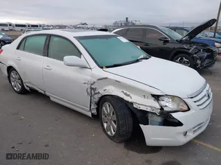2005 Toyota Avalon XL with VIN 4T1BK36B95U051814, listed as a IAAI auction lot 41052486 with 377,410 mi miles. Bid and sale history available at carsss.com. Image 1.