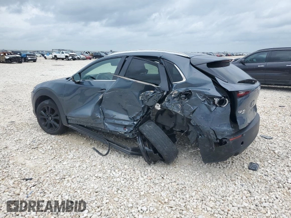 2023 Mazda CX-30 S Carbon Edition z VIN 3MVDMBCM2PM539130, wystawiony jako Copart lot #54817735 z przebiegiem 29 678 mil mil oraz Szkoda całkowita • Salvage title. Historia ofert i sprzedaży dostępna na DreamBid. Obrazek 2.