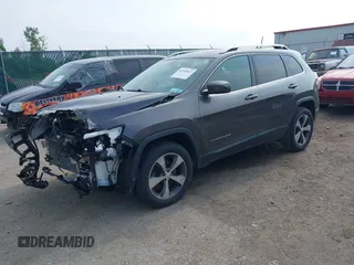 2019 Jeep Cherokee High Altitude with VIN 1C4PJMDX4KD260309, listed as a IAAI auction lot 42594817 with 63,664 mi miles and . Bid and sale history available at DreamBid. Image 2.