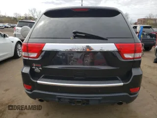 2011 Jeep Grand Cherokee Overland with VIN 1J4RR6GT9BC660730, listed as a Copart auction lot 53770745 with 106,351 mi miles and Salvage title. Bid and sale history available at DreamBid. Image 6.