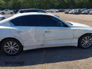 2014 Infiniti Q50 Premium with VIN JN1BV7AR0EM686530, listed as a IAAI auction lot 40381908 with 228,156 mi miles. Bid and sale history available at carsss.com. Image 13.