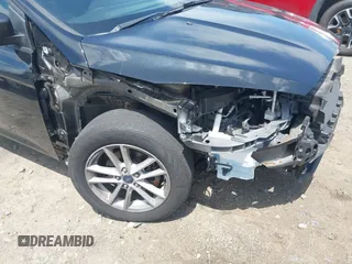 2016 Ford Focus SE with VIN 1FADP3F29GL256160, listed as a IAAI auction lot 42188124 with 72,868 mi miles and . Bid and sale history available at DreamBid. Image 6.