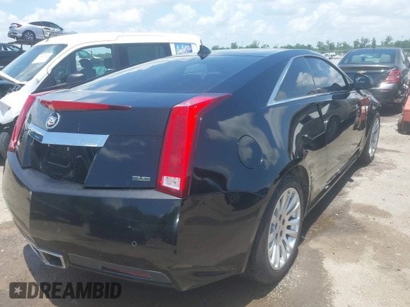 2012 Cadillac CTS Performance z VIN 1G6DJ1E31C0139231, wystawiony jako IAAI lot #42446853 z przebiegiem 102 857 mil mil oraz . Historia ofert i sprzedaży dostępna na DreamBid. Obrazek 4.