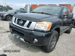 2015 Nissan Titan Pro-4X with VIN 1N6BA0EC1FN507894, listed as a Copart auction lot 65784274 with 147,576 mi miles and Salvage title. Bid and sale history available at DreamBid. Image 10.