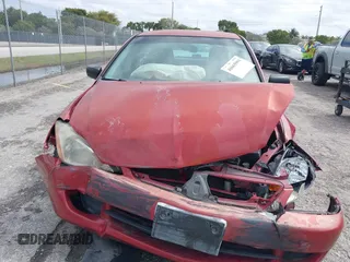 2006 Mitsubishi Lancer ES with VIN JA3AJ26E66U057223, listed as a IAAI auction lot 41665991 with 165,359 mi miles. Bid and sale history available at carsss.com. Image 12.
