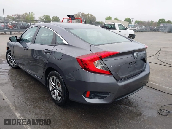2017 Honda Civic LX z VIN 19XFC2F53HE023730, wystawiony jako IAAI lot #41885003 z przebiegiem 129 595 mil mil oraz . Historia ofert i sprzedaży dostępna na DreamBid. Obrazek 3.