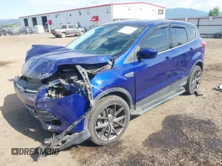 2013 Ford Escape SE with VIN 1FMCU9GXXDUB70983, listed as a IAAI auction lot 42432050 with 97,515 mi miles and . Bid and sale history available at DreamBid. Image 2.