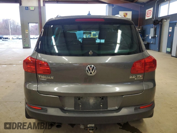 2015 Volkswagen Tiguan SE z VIN WVGBV7AX8FW574023, wystawiony jako Copart lot #50027465 z przebiegiem 101 145 mil mil oraz Czysty tytuł • Clean title. Historia ofert i sprzedaży dostępna na DreamBid. Obrazek 6.