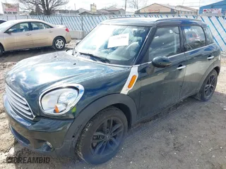 2013 MINI Cooper Countryman with VIN WMWZB3C58DWM09440, listed as a IAAI auction lot 41696396 with 52,930 mi miles. Bid and sale history available at carsss.com. Image 2.