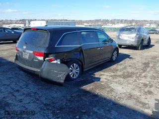 2016 Honda Odyssey SE with VIN 5FNRL5H34GB139571, listed as a IAAI auction lot 41602695 with 118,960 mi miles. Bid and sale history available at carsss.com. Image 4.