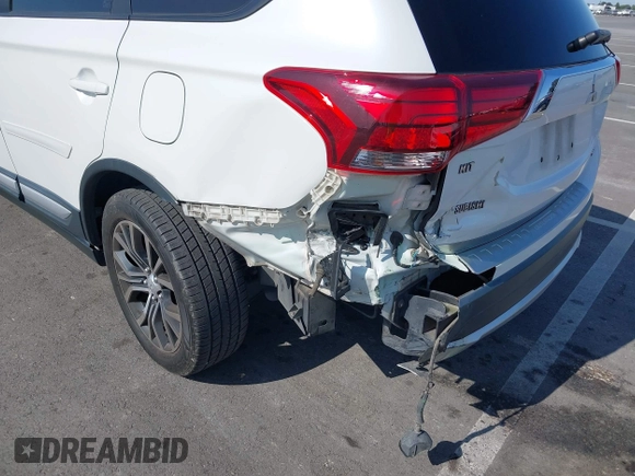 2016 Mitsubishi Outlander SE with VIN JA4AD3A33GZ013375, listed as a IAAI auction lot 42515722 with 106,804 mi miles and . Bid and sale history available at DreamBid. Image 6.