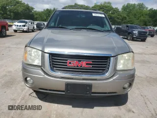 2002 GMC Envoy SLT z VIN 1GKDS13S722253150, wystawiony jako Copart lot #56255185 z przebiegiem 174 198 mil mil oraz Szkoda całkowita • Salvage title. Historia ofert i sprzedaży dostępna na DreamBid. Obrazek 5.