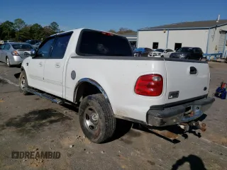 2002 Ford F-150 XLT with VIN 1FTRW07L42KB90527, listed as a Copart auction lot 85098244 with 143,213 mi miles and Salvage Title. Bid and sale history available at carsss.com. Image 2.