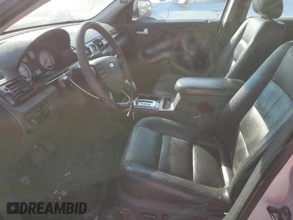 2005 Ford Five Hundred Limited with VIN 1FAFP25165G128086, listed as a Copart auction lot 75576824 with 194,715 mi miles and Salvage Title. Bid and sale history available at carsss.com. Image 7.