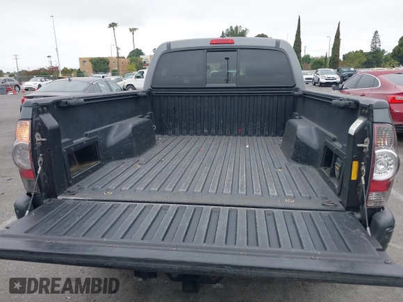 2014 Toyota Tacoma PreRunner with VIN 3TMKU4HN9EM041509, listed as a IAAI auction lot 42441194 with 290,715 mi miles and . Bid and sale history available at DreamBid. Image 18.