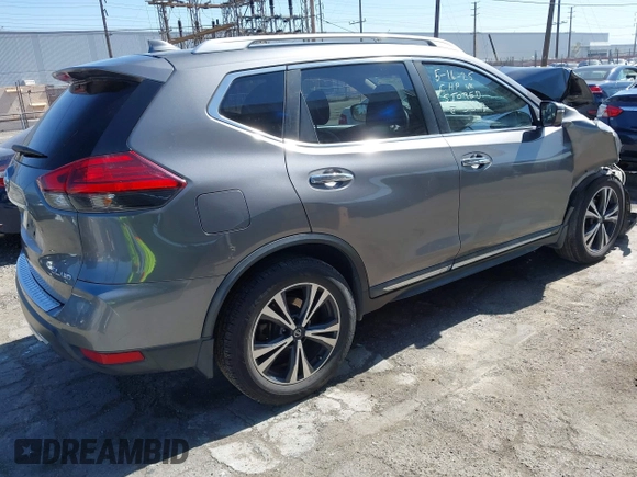 2017 Nissan Rogue S with VIN JN8AT2MV9HW263307, listed as a IAAI auction lot 42317181 with 114,445 mi miles and . Bid and sale history available at DreamBid. Image 4.