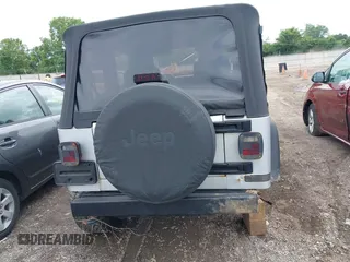 2004 Jeep Wrangler Sport with VIN 1J4FA49S44P772575, listed as a IAAI auction lot 42512876 with 226,387 mi miles and . Bid and sale history available at DreamBid. Image 17.
