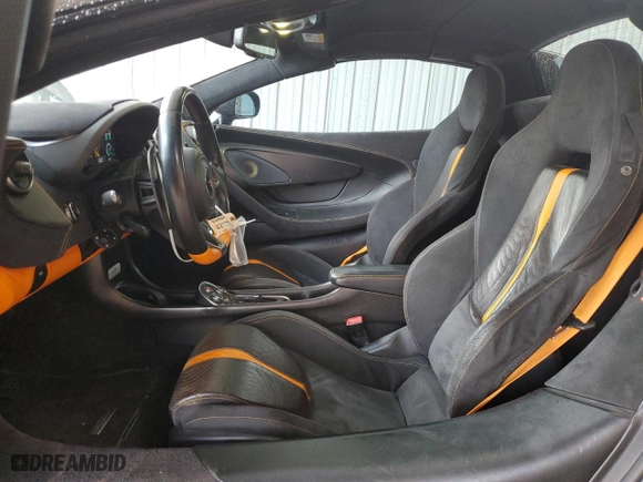 2018 McLaren 570S with VIN SBM13FAA1JW004280, listed as a Copart auction lot 63609654 with 22,596 mi miles and Salvage Title. Bid and sale history available at carsss.com. Image 7.