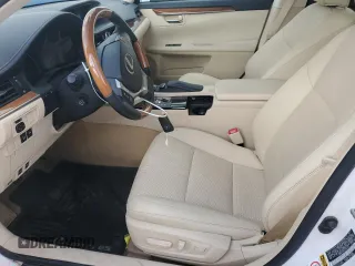 2014 Lexus ES 300h with VIN JTHBW1GG4E2042553, listed as a Copart auction lot 55691465 with 65,045 mi miles and Salvage title. Bid and sale history available at DreamBid. Image 7.
