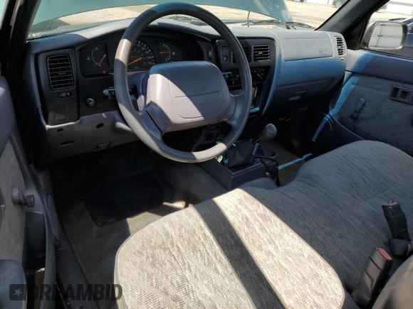 1999 Toyota Tacoma z VIN 4TANL42N5XZ453478, wystawiony jako Copart lot #56711635 z przebiegiem 197 412 mil mil oraz Szkoda całkowita • Salvage title. Historia ofert i sprzedaży dostępna na DreamBid. Obrazek 8.