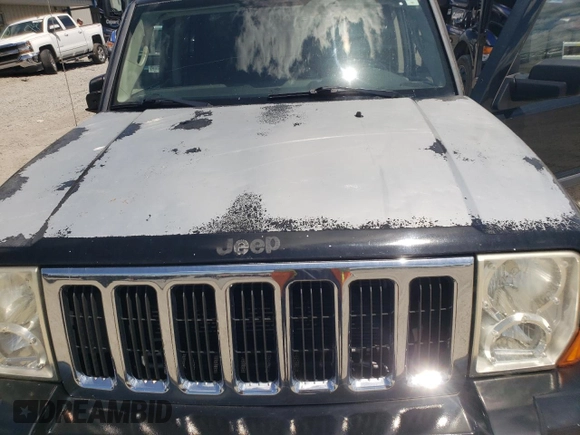 2008 Jeep Commander Sport z VIN 1J8HG48K38C180234, wystawiony jako Copart lot #55959325 z przebiegiem 198 459 mil mil oraz Szkoda całkowita • Salvage title. Historia ofert i sprzedaży dostępna na DreamBid. Obrazek 12.