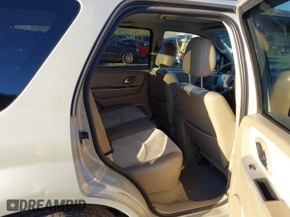 2006 Mercury Mariner Luxury с VIN 4M2YU571X6DJ08480, выставлен на аукционе IAAI как лот 41094486 с пробегом 138 138 миль миль и . История ставок и продаж доступна на DreamBid. Изображение 8.