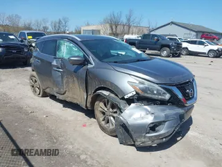 2018 Nissan Murano Platinum with VIN 5N1AZ2MH7JN182561, listed as a IAAI auction lot 42059371 with 94,859 mi miles and . Bid and sale history available at carsss.com. Image 1.
