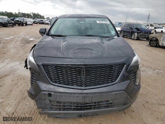 2023 Cadillac XT4 FWD Luxury with VIN 1GYAZAR45PF218684, listed as a Copart auction lot 54427565 with 74,920 mi miles and Salvage Title. Bid and sale history available at carsss.com. Image 5.