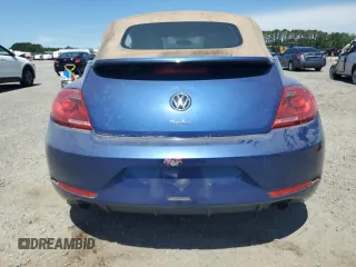 2013 Volkswagen Beetle z VIN 3VW7S7AT8DM826556, wystawiony jako Copart lot #57576925 z przebiegiem 62 951 mil mil oraz Tytuł czysty. Historia ofert i sprzedaży dostępna na DreamBid. Obrazek 6.