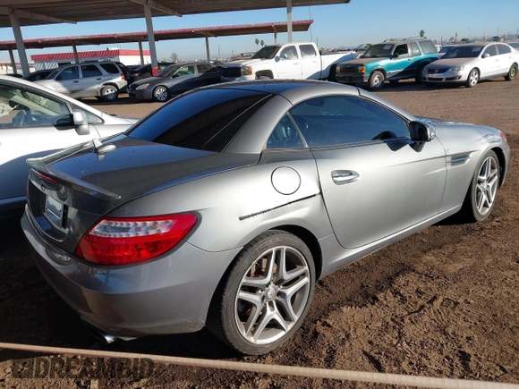 2013 Mercedes-Benz SLK-Class SLK 250 with VIN WDDPK4HA9DF058128, listed as a IAAI auction lot 41809272 with 76,860 mi miles. Bid and sale history available at carsss.com. Image 4.