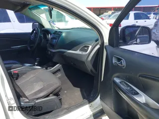2013 Dodge Journey American Value with VIN 3C4PDCAB0DT723988, listed as a IAAI auction lot 42263191 with 205,014 mi miles and . Bid and sale history available at DreamBid. Image 5.