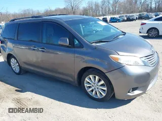 2012 Toyota Sienna XLE with VIN 5TDDK3DC5CS047530, listed as a IAAI auction lot 41780049 with 209,812 mi miles. Bid and sale history available at carsss.com. Image 1.