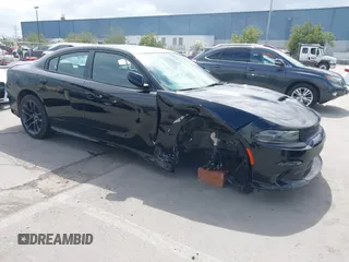 2021 Dodge Charger R/T with VIN 2C3CDXCT4MH651945, listed as a IAAI auction lot 41861896 with 25,569 mi miles and . Bid and sale history available at carsss.com. Image 1.