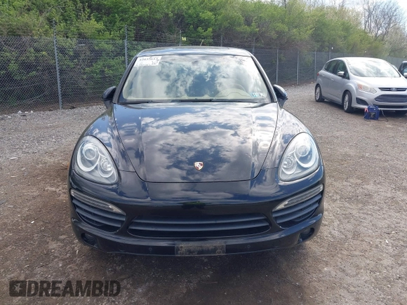2011 Porsche Cayenne S Hybrid with VIN WP1AE2A27BLA91799, listed as a IAAI auction lot 42035613 with 131,480 mi miles. Bid and sale history available at carsss.com. Image 12.