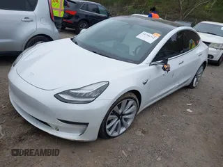 2020 Tesla Model 3 Long Range with VIN 5YJ3E1EB0LF703733, listed as a IAAI auction lot 41796732 with 75,027 mi miles. Bid and sale history available at carsss.com. Image 19.