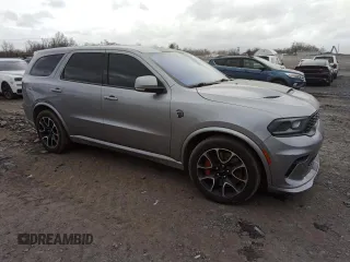 2021 Dodge Durango SRT Hellcat with VIN 1C4SDJH97MC643259, listed as a Copart auction lot 44536555 with 49,489 mi miles and Salvage Title. Bid and sale history available at DreamBid. Image 4.