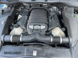 2011 Porsche Cayenne S with VIN WP1AB2A22BLA47332, listed as a Copart auction lot 65087385 with 112,033 mi miles and Salvage title. Bid and sale history available at DreamBid. Image 7.