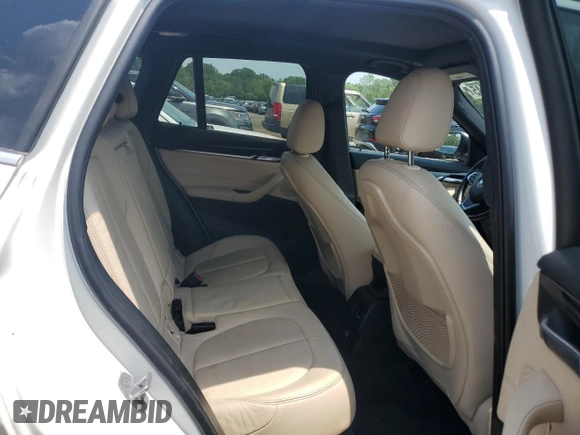 2017 BMW X1 xDrive28i with VIN WBXHT3Z3XH4A55624, listed as a Copart auction lot 59773545 with 140,251 mi miles and Salvage title. Bid and sale history available at DreamBid. Image 10.