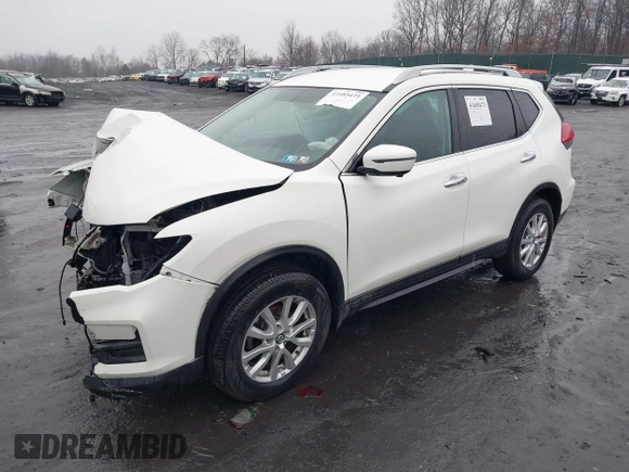 2017 Nissan Rogue SV with VIN 5N1AT2MVXHC881406, listed as a IAAI auction lot 41685473 with 69,206 mi miles and . Bid and sale history available at carsss.com. Image 2.