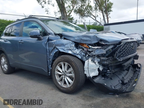 2022 Toyota Corolla Cross LE with VIN 7MUBAAAG1NV004852, listed as a IAAI auction lot 42251301 with 50,197 mi miles and . Bid and sale history available at DreamBid. Image 6.