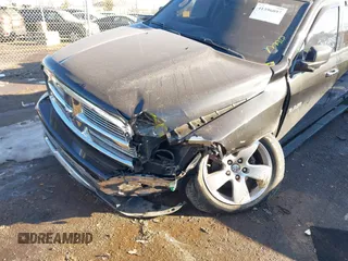 2009 Dodge 1500 Laramie z VIN 1D3HV13T49S730776, wystawiony jako IAAI lot #41396097 z przebiegiem 206 684 mil mil oraz . Historia ofert i sprzedaży dostępna na DreamBid. Obrazek 6.