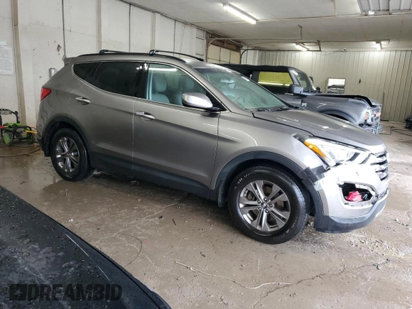 2014 Hyundai Santa Fe with VIN 5XYZU3LB1EG227984, listed as a Copart auction lot 59569905 with 102,477 mi miles and Salvage title. Bid and sale history available at DreamBid. Image 4.