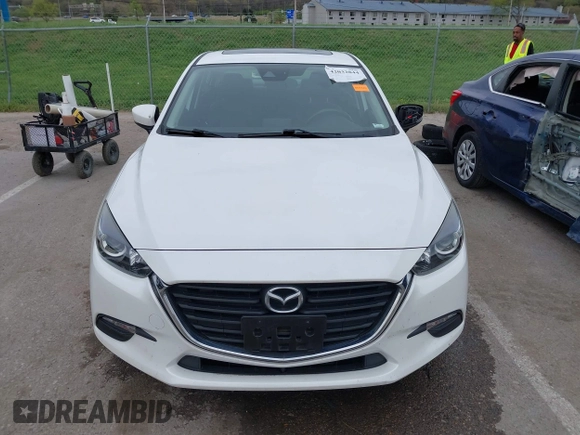 2018 Mazda 3 Touring with VIN 3MZBN1V32JM190611, listed as a IAAI auction lot 42032844 with 63,493 mi miles and . Bid and sale history available at DreamBid. Image 13.