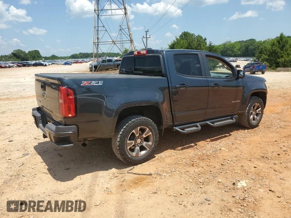 2018 Chevrolet Colorado 4WD Z71 z VIN 1GCGTDEN7J1110282, wystawiony jako Copart lot #61945695 z przebiegiem 144 792 mil mil oraz Szkoda całkowita • Salvage title. Historia ofert i sprzedaży dostępna na DreamBid. Obrazek 3.