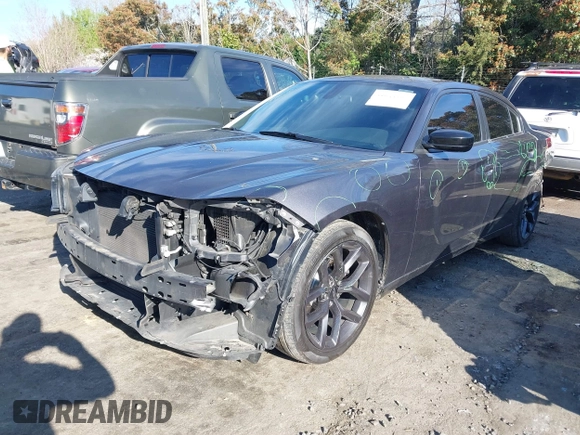 2020 Dodge Charger SXT with VIN 2C3CDXBG7LH101173, listed as a IAAI auction lot 41844489 with 157,773 mi miles. Bid and sale history available at carsss.com. Image 2.