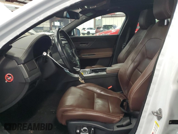 2016 Jaguar XF S with VIN SAJBG4BV0GCY00411, listed as a Copart auction lot 66068964 with 94,983 mi miles and Salvage Title. Bid and sale history available at carsss.com. Image 7.