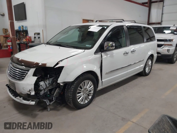 2014 Chrysler Town & Country Limited with VIN 2C4RC1GG7ER178802, listed as a IAAI auction lot 41863918 with 103,777 mi miles and . Bid and sale history available at DreamBid. Image 23.